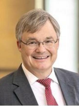 Dr․ Axel Spies
